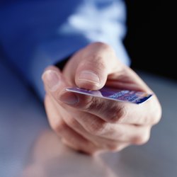 Hand Holding a Credit Card