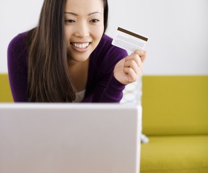 Smiling woman shopping online