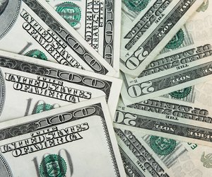 Close-up of one hundred and twenty dollar bills