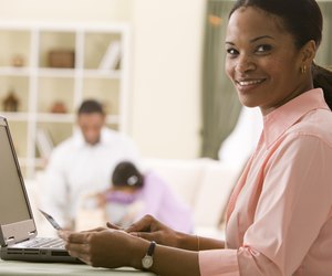 Woman making online purchase with credit card