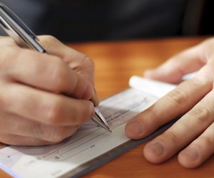 Man writing a check