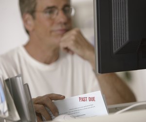 Man paying bills online