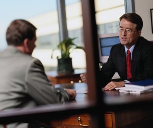 Businessmen Talking in an Office
