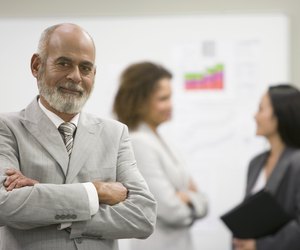 Senior African businessman with arms crossed