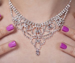Woman's Neck And Her Beautiful Necklace