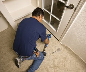 Man Installing Carpet