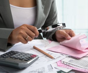 Woman checking bills