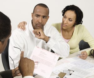 Couple Talking with Accountant