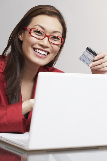 Asian businesswoman shopping online