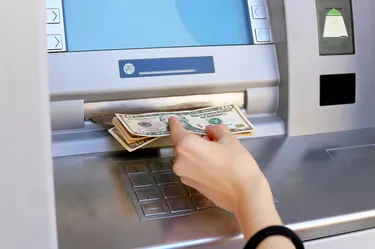 inserting a credit card to ATM