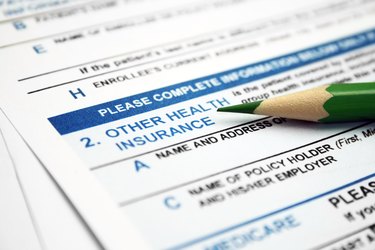 Health insurance form with lead pencil resting on it