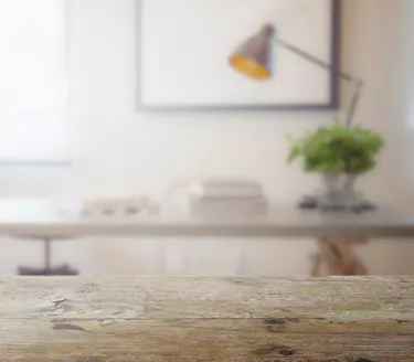 How Do I Calculate Square Foot Percentage?wooden table top with blur of modern working table