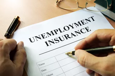 Unemployment insurance form on a table.