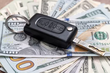 What Is Per Diem on a Car Loan?                 car key on dollar bills