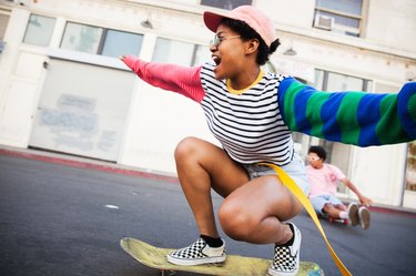 Young woman skateboarding