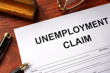 Unemployment claim form on an office table.