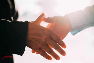 Close-up of business people hands shaking