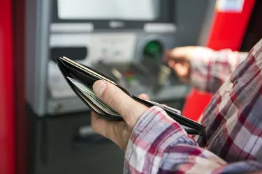 Man withdrawing money from ATM