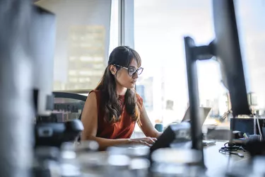 Mid Adult Buenos Aires Businesswoman Working on Laptop