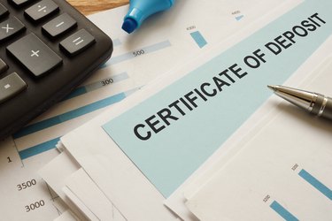 certificate of deposit CD is shown on the conceptual business photo