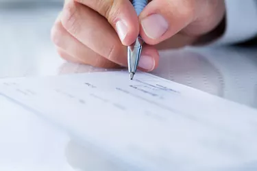 How to Sign a Bank Check When You Are the Power of Attorney