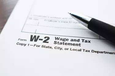 Tax Form W-2 Close Up With Pen High Quality