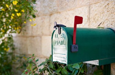 US post mail letter box with red flag