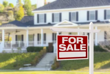 Home For Sale Sign in Front of New House