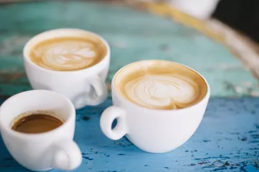 People talking in the cafe while having some fresh coffee