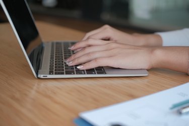 businesswoman freelancer working with computer. woman analyzing data. student studying doing assignment