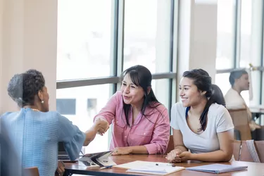 Women meet with loan officer