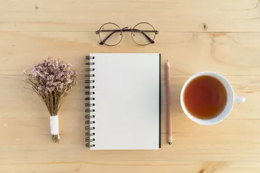 Notebook with teacup