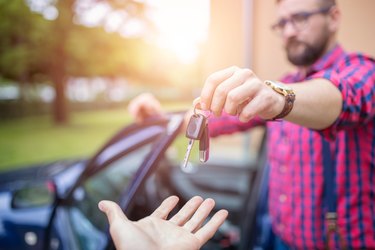 What Happens After Voluntary Repossession on a Vehicle?Giving back car keys