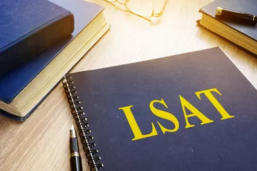 LSAT study guide on a table.