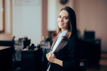 Confident Business Woman Standing in the Office