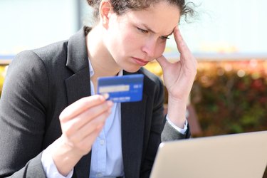 Worried businesswoman complaining buying online