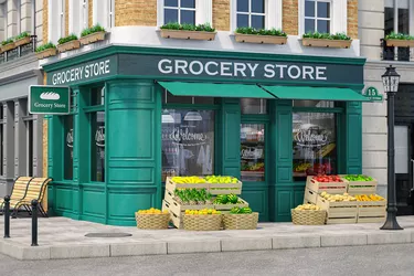 Grocery store shop in vintage style with fruit and vegetables crates on the street.