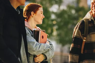 Students walking outside in college campus