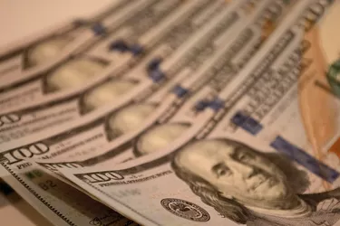 economic stimulus: six crisp $100 bills