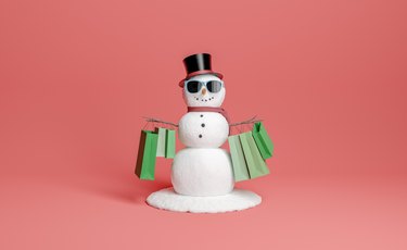 snowman in christmas and winter shopping concept