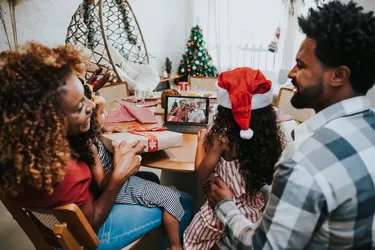 Happy family celebrating Christmas at home