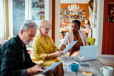 Financial advisor helping a senior couple