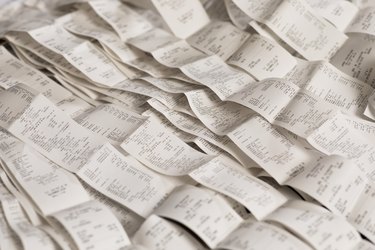High angle view of various receipts