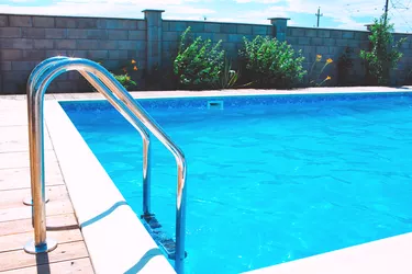 Swimming pool with stair at hotel.