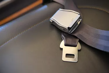 Seat belt lies on the aircraft seat Flight safety concept