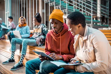 Students socializing in the lobby of the university