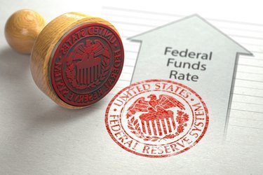 Federal funds rate increase. Arrow with growth of federal fund rate and stamp of federal reserve FRS symbol.