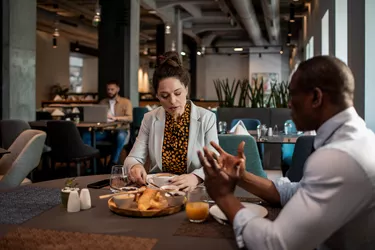 Business colleagues having breakfast in a restaurant