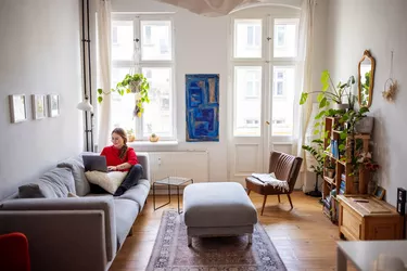 Woman working at home using laptop