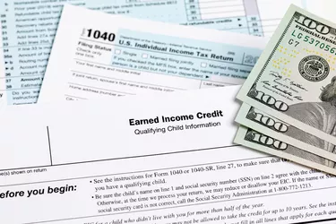Earned income tax credit form. Tax credit, deduction and tax return concept.